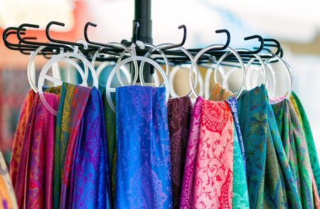 Close-up of colorful scarves hanging in the market