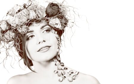 Beautiful young woman with wreath on her head