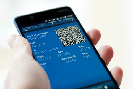 Mobile phone with mobile boarding passの写真素材