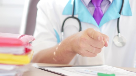 Medical doctor pointing with his fingerの写真素材