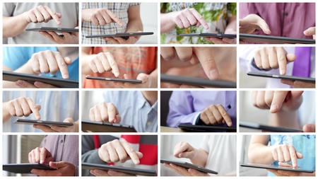 Man hand touching screen on modern digital tablet pc. Close-up image with shallow depth of field. Concept of modern gadgets in useの写真素材