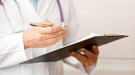 Medical doctor explaining something for patient by making hands gestures.