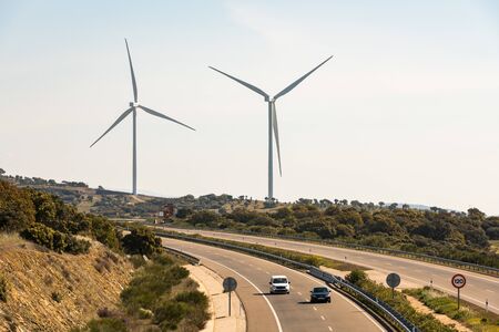 A pair of windmills in the Sierra del Merengue wind farm next to the Ruta de la Plata highway...