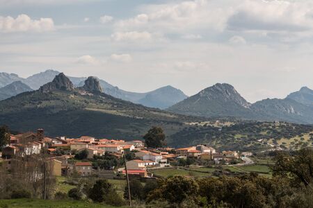 Village of Retamosa and the characteristic mountain range of the Villuercas Ibores Jara Geopark in Extremaduraの写真素材