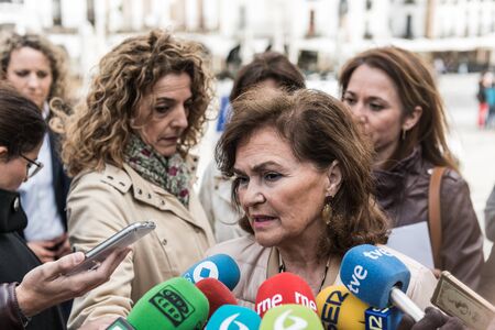 Spanish Vice-President Carmen Calvo Poyato at a press conference in the Plaza Mayor de Caceres, Extremadura, Spainのeditorial素材