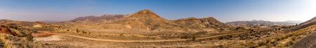 Panoramic view of the wavy, arid and colorful landscape of Painted Hillsの写真素材