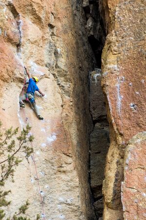 Climbers on one of the rock walls of Smith Rock State Parkのeditorial素材