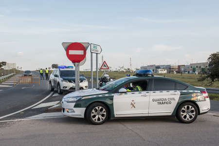 The civil guard guards entrance of Arroyo de la Luz becuase of the COVID19 cases.のeditorial素材