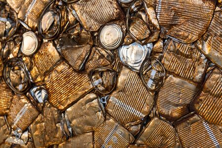 Detail of a block of rusty compacted cansの写真素材