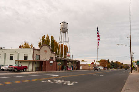 Old water tank and local businesses on Main Street in Merrillのeditorial素材