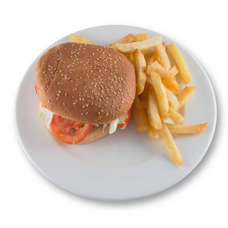 Plate with a simple burger with tomato, lettuce and potatoesの写真素材