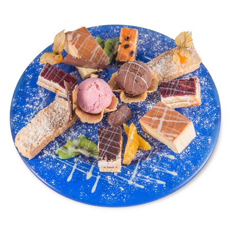 Desserts with strawberry and chocolate ice cream, cheesecake, San Marco cake, dulce de leche and coconut flanの写真素材