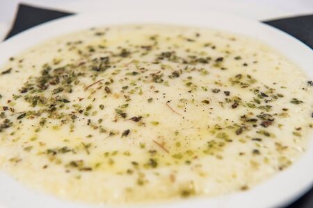 Detail of a grilled and melted provolone cheese with oreganoの写真素材