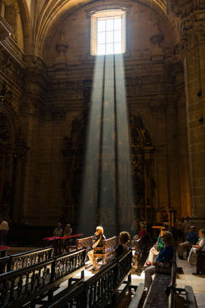 People praying in the pews of the church of Santa Maria , Gipuzkoaのeditorial素材