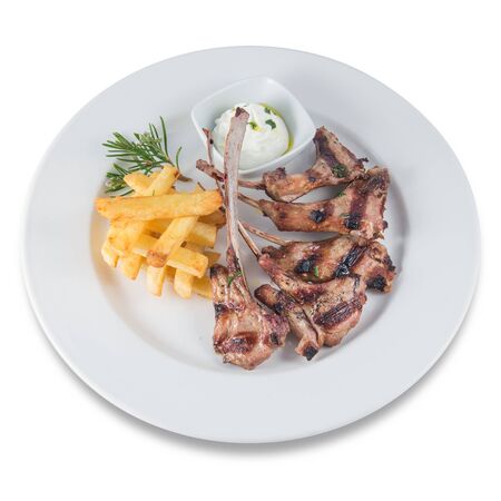 Lamb chops with rosemary and chipsの写真素材