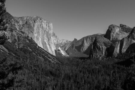 Tunnel View Point in Yosemite National Park with El Capitan, Cathedral Rocks and the Half Dome in the backgroundの写真素材