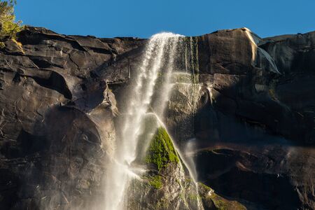 Views of the upper part of the Bridalveil waterfall from below in Yosemite National Park, California, USAの写真素材