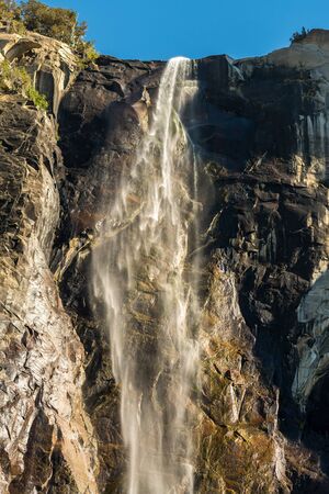 Views of the Bridalveil waterfall seen from below in Yosemite National Park, California, USAの写真素材