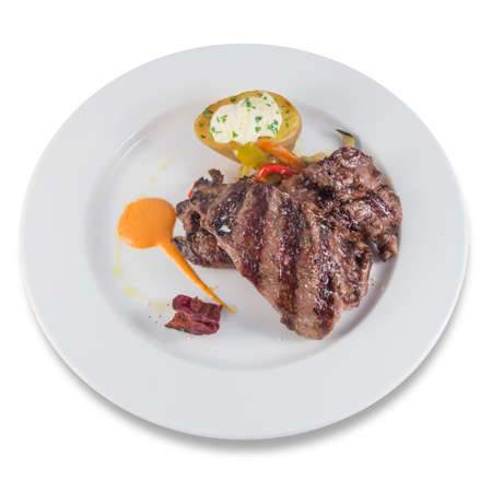 Iberian pork feather loin with baked potatoの写真素材