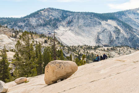 Tourists on the Olmsted Point granite hills in Yosemite National Parkのeditorial素材