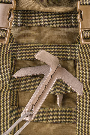 hook cat on tactical military green olive backpack with molle systemの写真素材