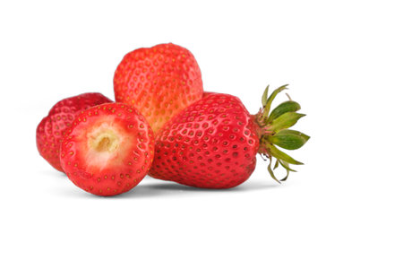 4 ripe strawberries berries isolate. natural from the garden. Strawberry with root, leavesの写真素材