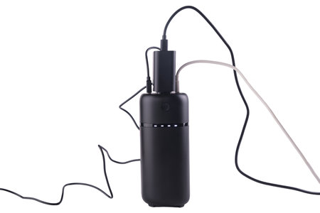 powerbank black isolated on a white background, usb cables, plugの写真素材