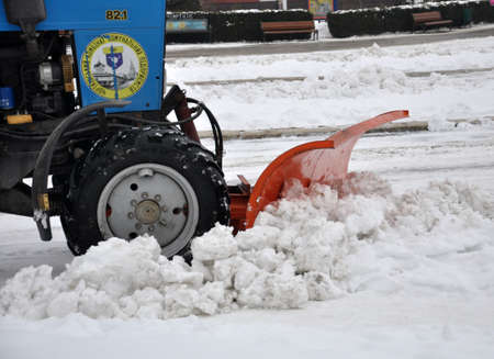 Chortkiv - Ternopil - Ukraine - January 28, 2019. In winter, the municipal service removes the city street from the snow.のeditorial素材