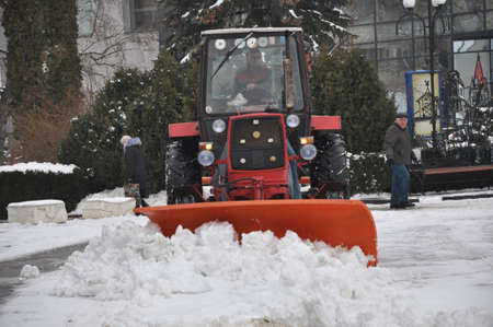 Chortkiv - Ternopil - Ukraine - January 28, 2019. In winter, the municipal service removes the city street from the snow.のeditorial素材