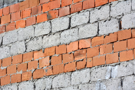 A fragment of the masonry wall of the building