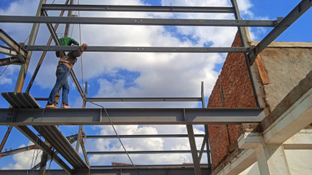 Structure of steel for building construction on sky background.