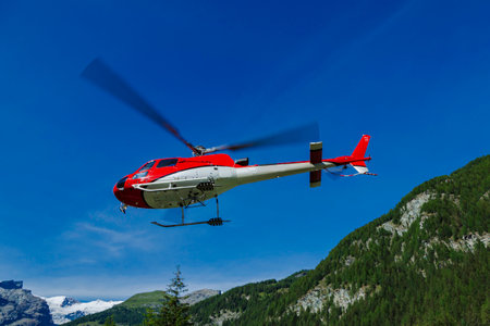 mountain rescue helicopter in mountain locationsの写真素材