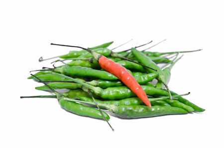 Green and red bird chilli の写真素材