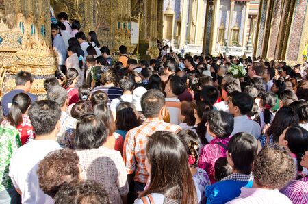 Tourists flock to worship and pray the Emerald Buddha statue enshrined at Wat Phra Kaew in January...