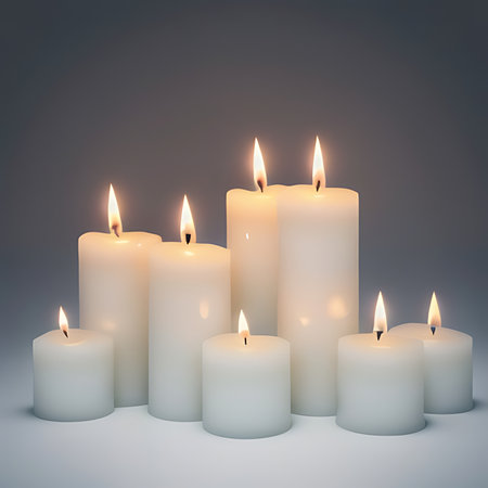 Burning candles on a gray background. 3d rendering. Toned image.の素材