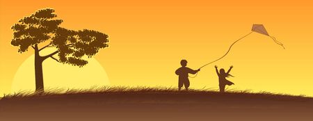 Two children on call of the sun start the paper snakeの写真素材