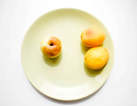 Peaches on a plateの写真素材