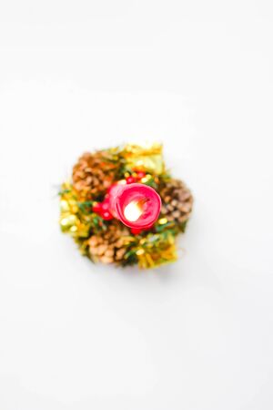 Beautiful and magical Christmas candle on holidayの写真素材