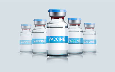 Realistic vaccine vial bottles for intramuscular injections isolated on a gray background. Vaccination and immunization concept, pharmaceutical industry background,  cure manufacture.のイラスト素材