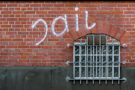 Grate and window of a prison cellの写真素材