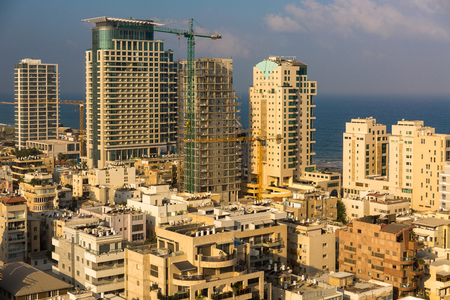 Elevated view to Tel Aviv Israel urban scycrapers with mediterranean sea in the backgroundの写真素材