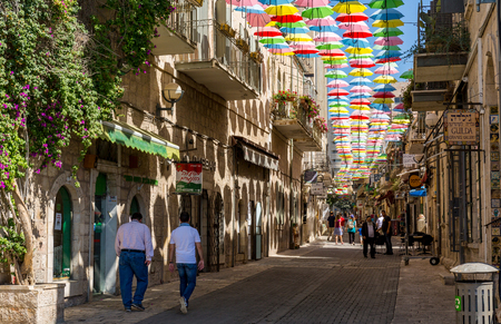 Jerusalem, Israel, August 5th. 2016 - Multicolored umbrellas above the street Yoel Moshe Salomon in Jerusalem, district Nachalat Shiva.のeditorial素材