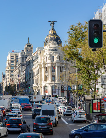 Madrid, Spain - November 29, 2018: Rush-hour on the Calle de Acala in front of the Metropolis Building, with cars, buses, pedestrians and motorbikes.のeditorial素材