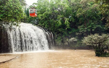 Vietnam, Dalat - November 05, 2017: Cableway under waterfall in Prenn park.のeditorial素材