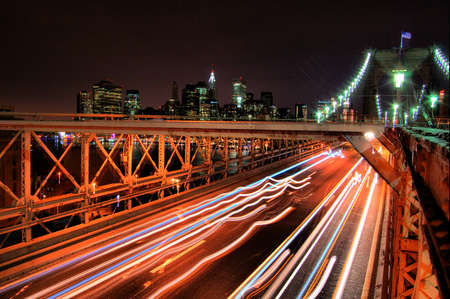 Night view of Manhattan from the Brooklyn Bridge (New York)の写真素材