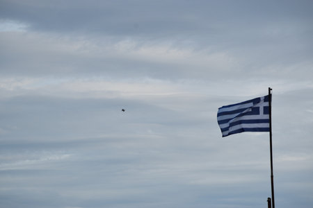View of the main monuments of Greece. Lepanto, site of the battle where Miguel de Cervantes Saavedra, the author of Don Quixote, participated. Fishing village, Ionian Sea. Greek flagの写真素材