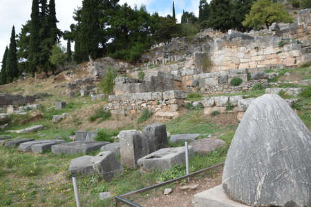 View of the main monuments of Greece. Ruins of Delphi. Oracle of Delphi. Old stone wallの写真素材