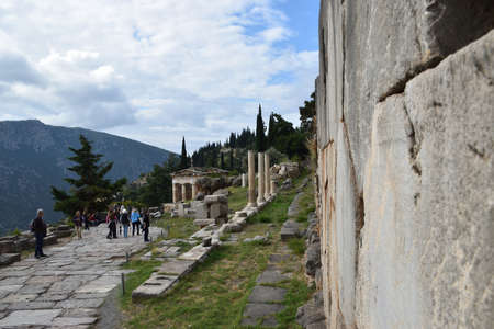 View of the main monuments of Greece. Ruins of Delphi. Ancient stone wallのeditorial素材