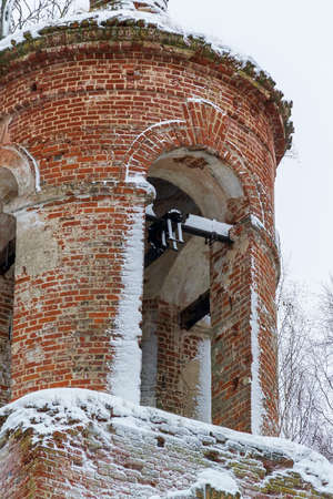 the ruins of the destroyed Orthodox bell tower, of the Archangel Church, Galichsky district, Kostroma province, Russiaの写真素材