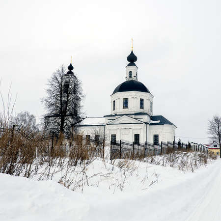 White brick Orthodox church in winter, Sungurovo village, Kostroma region, Russiaの写真素材